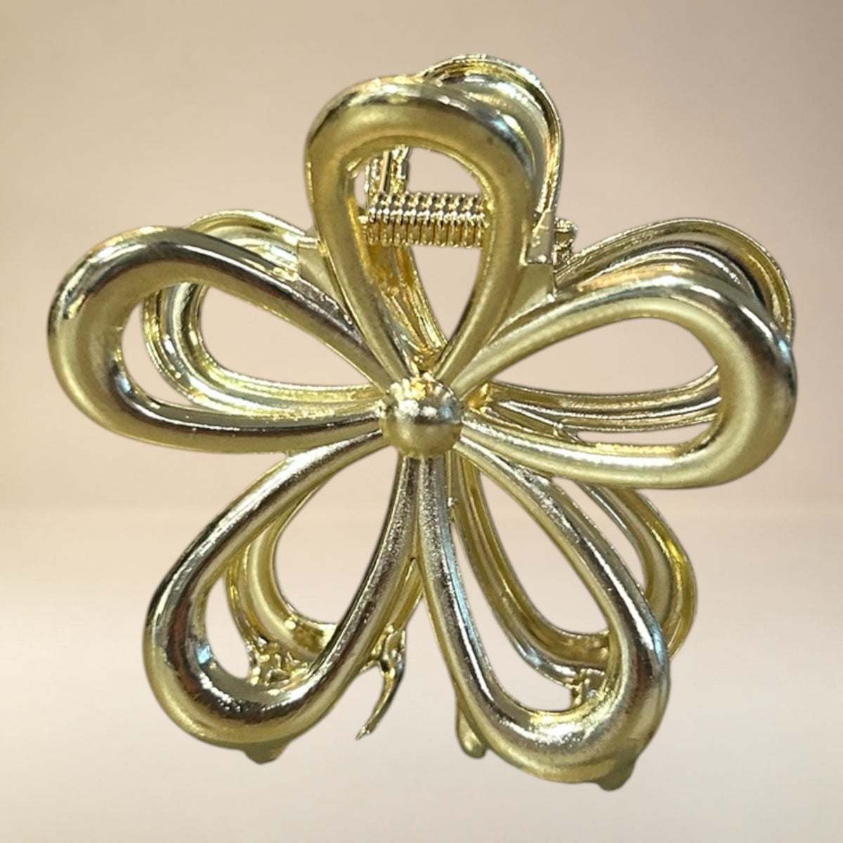 Gouden bloemen klem